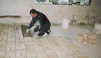 laying tiles over limecrete